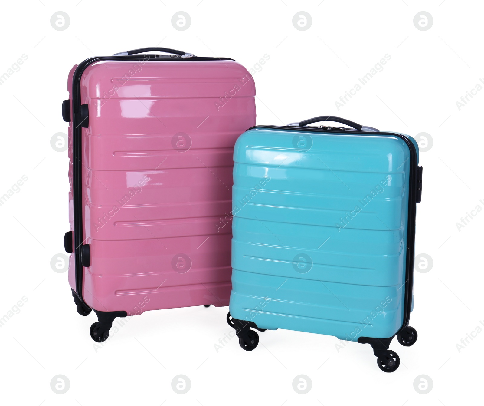 Stylish suitcases packed for travel on white background. Summer vacation Photo of Stylish suitcases packed for travel on white background. Summer vacation