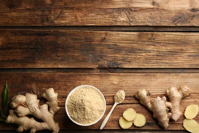 Dry ginger powder and fresh root on wooden table, flat lay. Space for text Photo of Dry ginger powder and fresh root on wooden table, flat lay. Space for text
