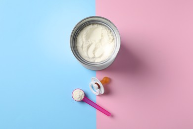 Flat lay composition with powdered infant formula on color background. Baby milk Photo of Flat lay composition with powdered infant formula on color background. Baby milk