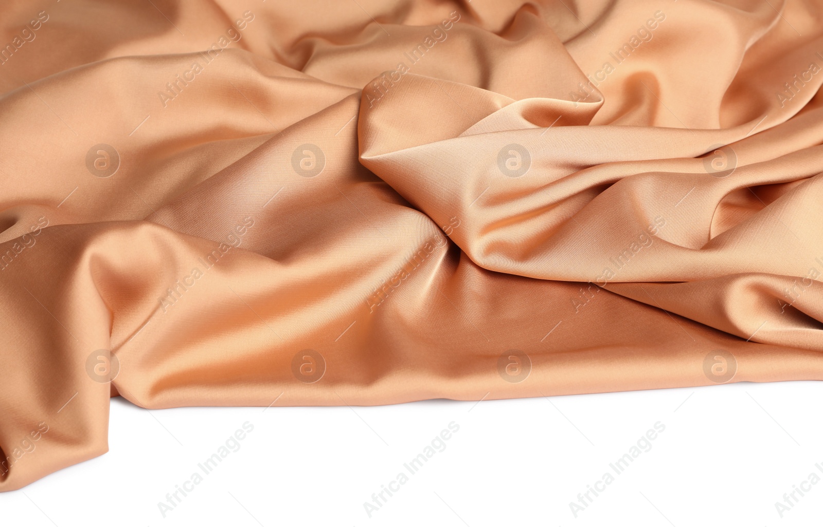 Beautiful delicate peach silk on white background Photo of Beautiful delicate peach silk on white background