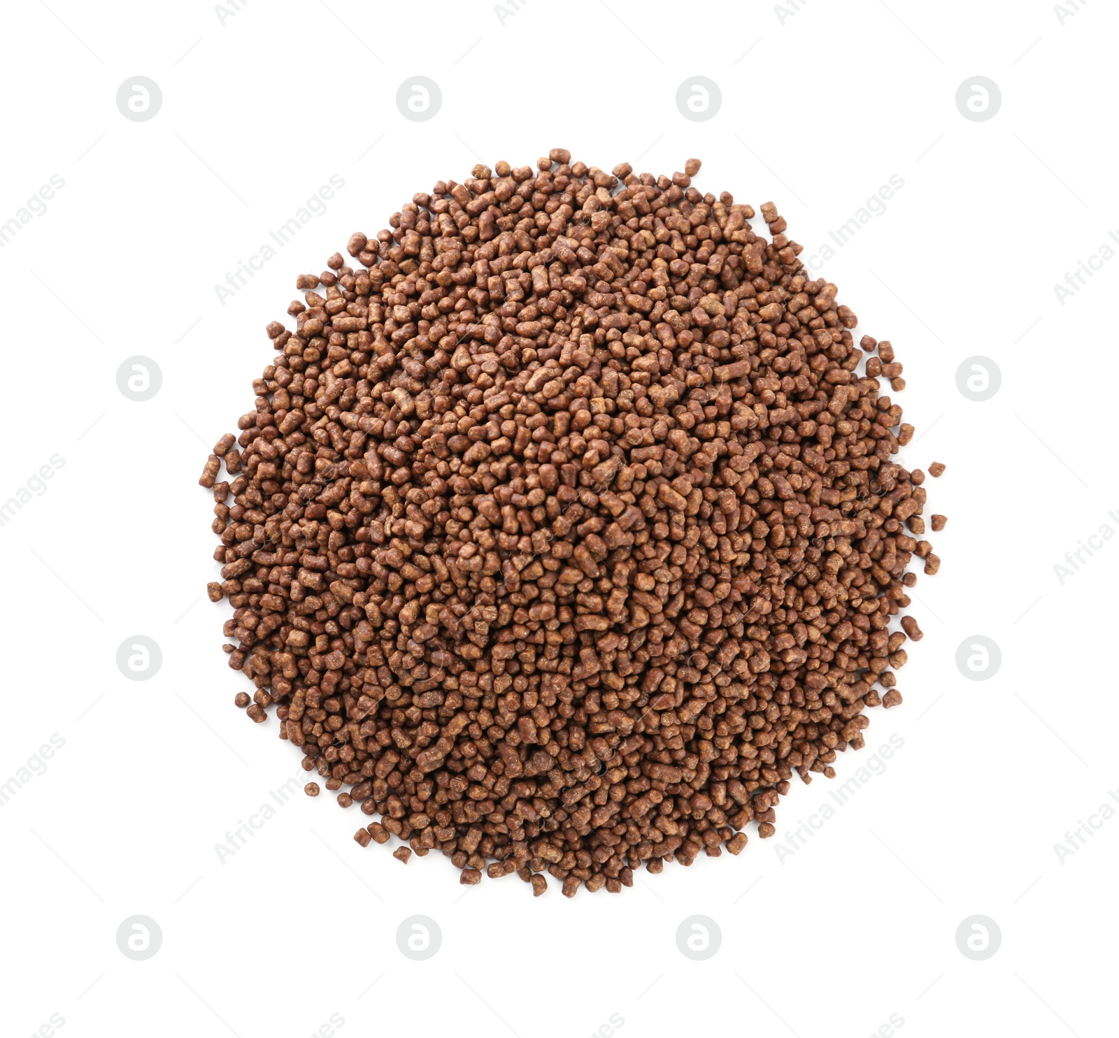 Pile of buckwheat tea granules on white background, top view Photo of Pile of buckwheat tea granules on white background, top view
