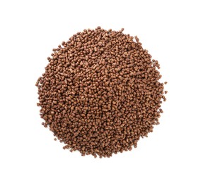 Pile of buckwheat tea granules on white background, top view Photo of Pile of buckwheat tea granules on white background, top view