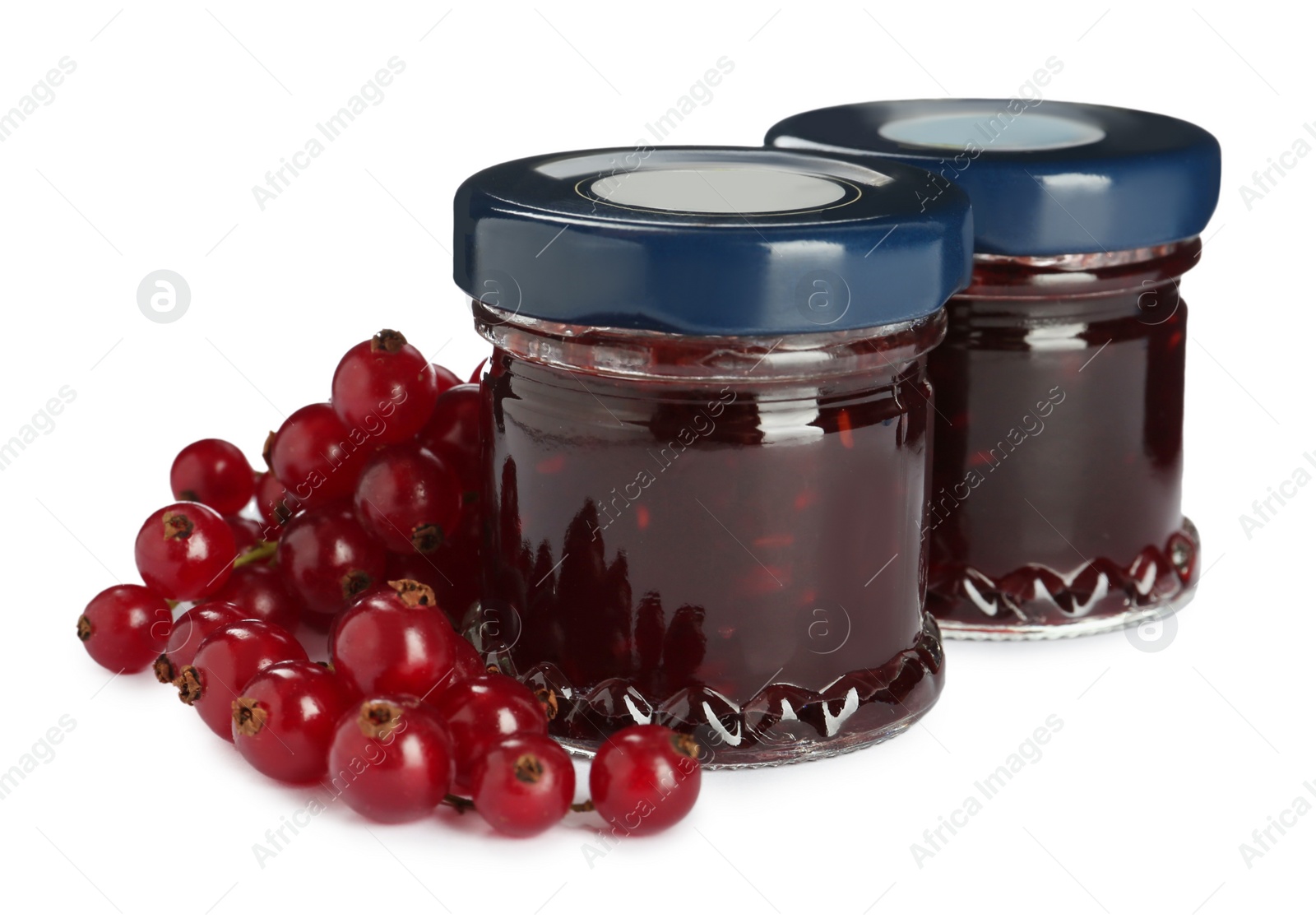 Jars with sweet jam and fresh berries on white background Photo of Jars with sweet jam and fresh berries on white background