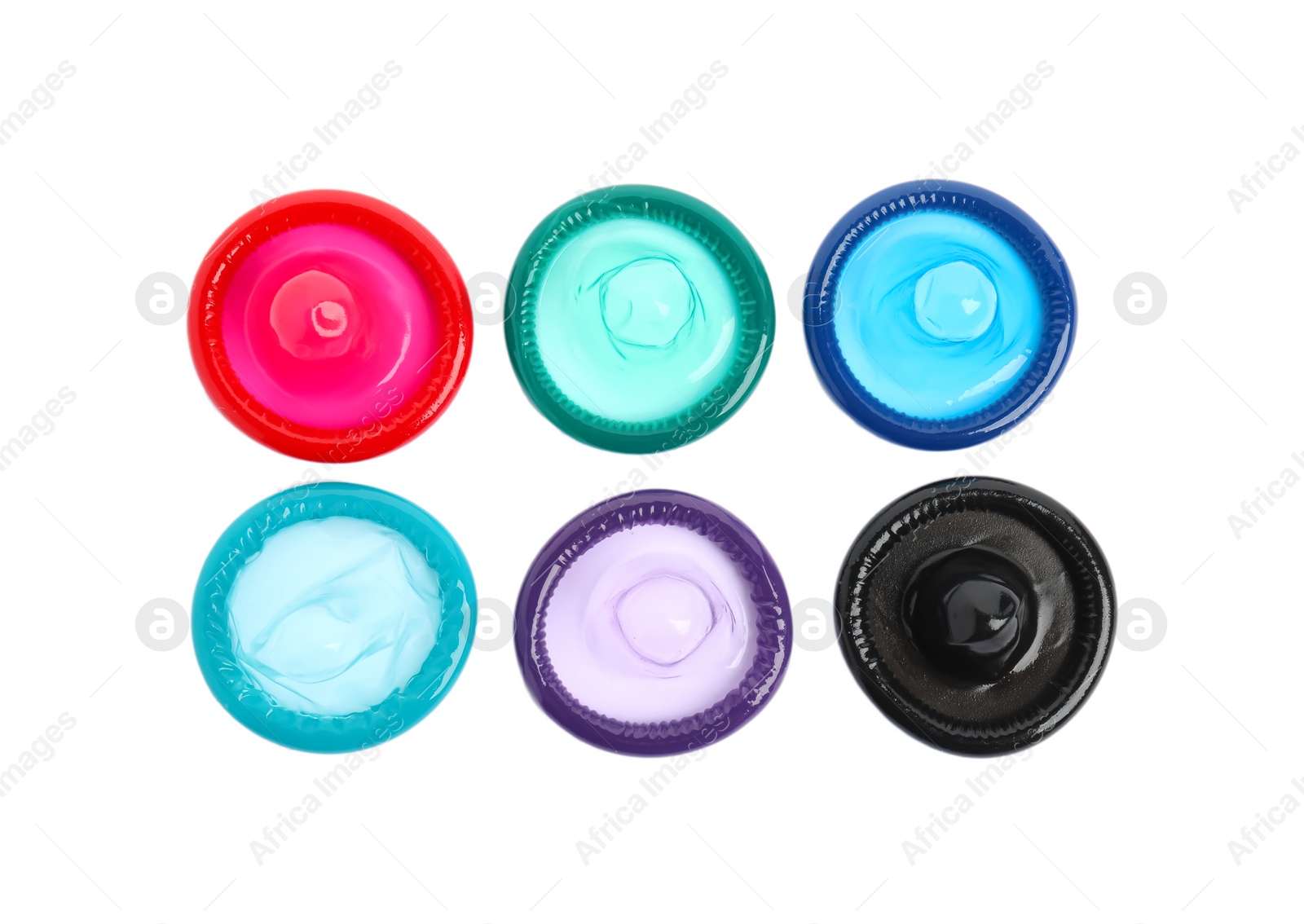 Unpacked colorful condoms on white background, top view. Safe sex Photo of Unpacked colorful condoms on white background, top view. Safe sex