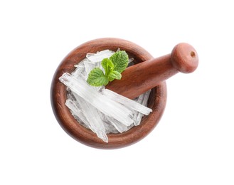 Menthol crystals and mint leaves on white background, top view Photo of Menthol crystals and mint leaves on white background, top view