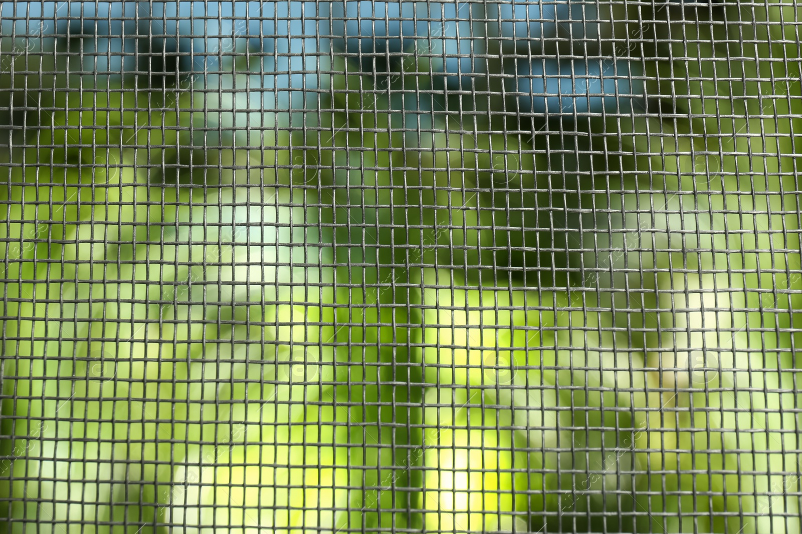 Insect screen for window against blurred background, closeup Photo of Insect screen for window against blurred background, closeup