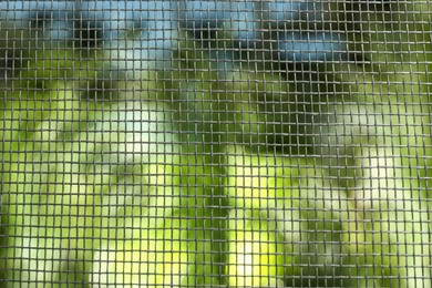 Insect screen for window against blurred background, closeup Photo of Insect screen for window against blurred background, closeup