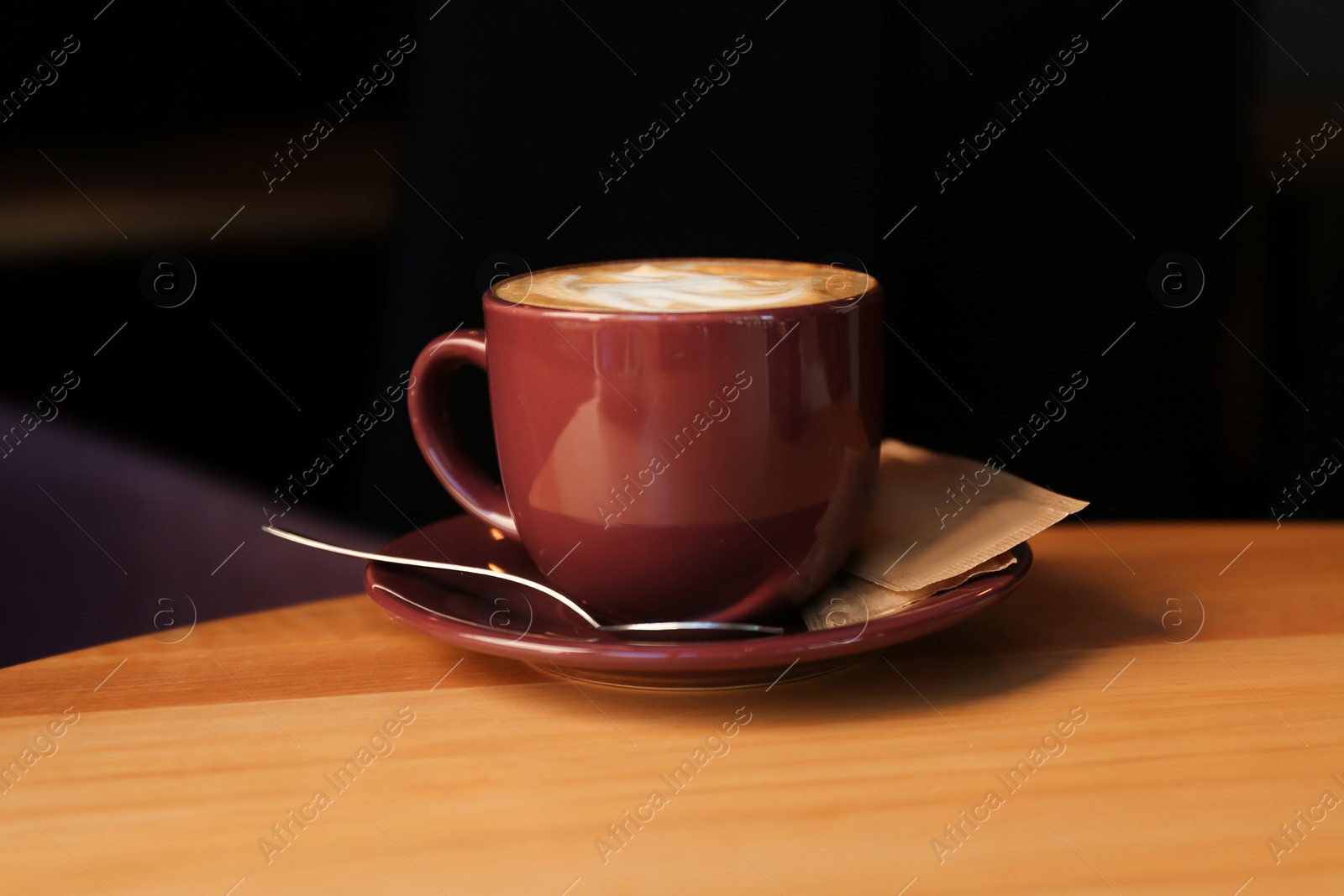 Aromatic coffee on wooden table in cafe Photo of Aromatic coffee on wooden table in cafe