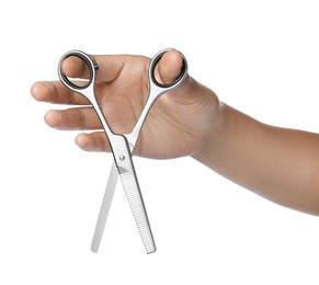 Hairdresser holding professional thinning scissors isolated on white, closeup. Haircut tool Photo of Hairdresser holding professional thinning scissors isolated on white, closeup. Haircut tool