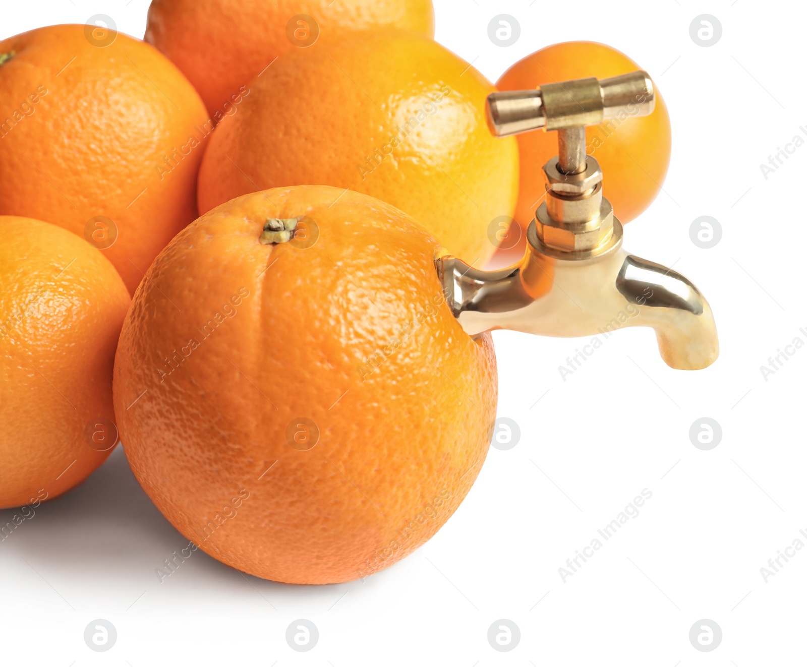 Fresh oranges with tap on white background. Making juice Photo of Fresh oranges with tap on white background. Making juice
