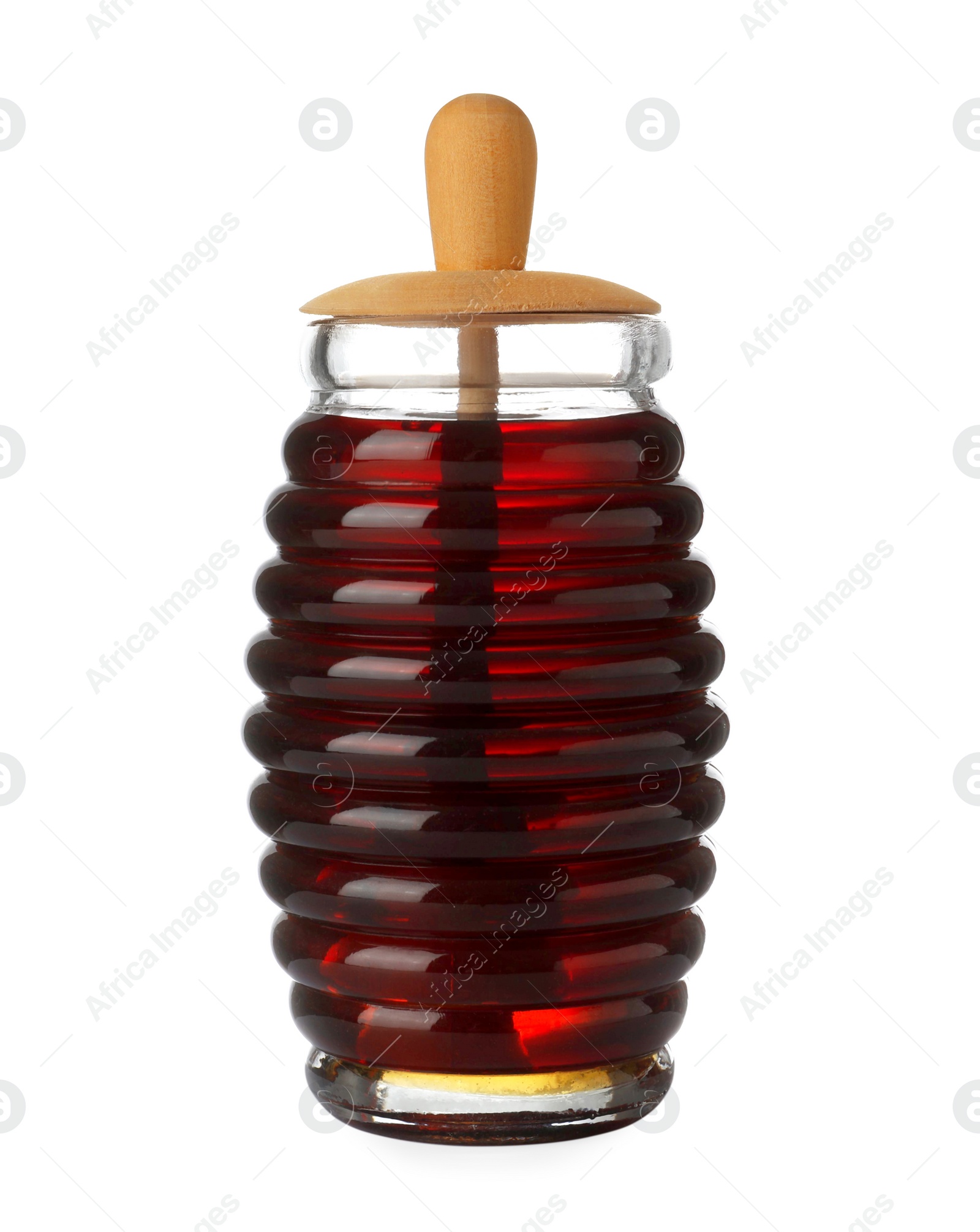 Jar with organic honey and dipper isolated on white Photo of Jar with organic honey and dipper isolated on white