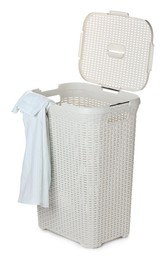 Plastic laundry basket with garment isolated on white Photo of Plastic laundry basket with garment isolated on white