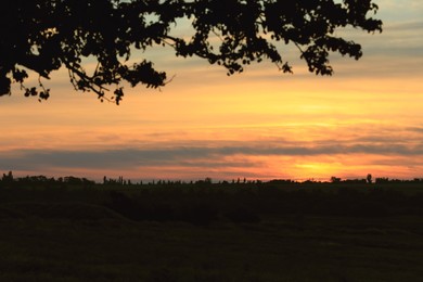 Picturesque view of beautiful countryside sunrise. Early morning landscape Photo of Picturesque view of beautiful countryside sunrise. Early morning landscape