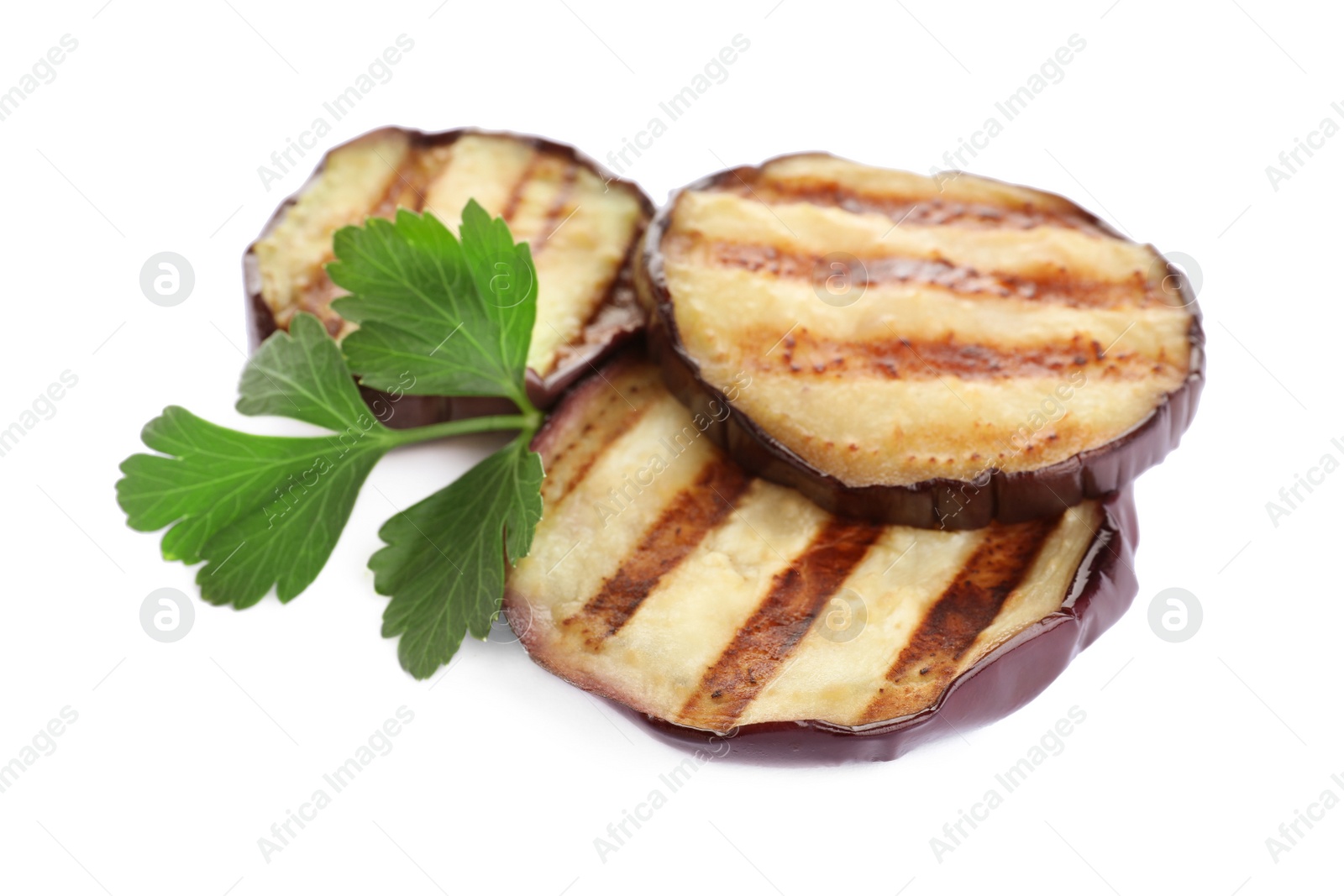 Delicious grilled eggplant slices and parsley on white background Photo of Delicious grilled eggplant slices and parsley on white background