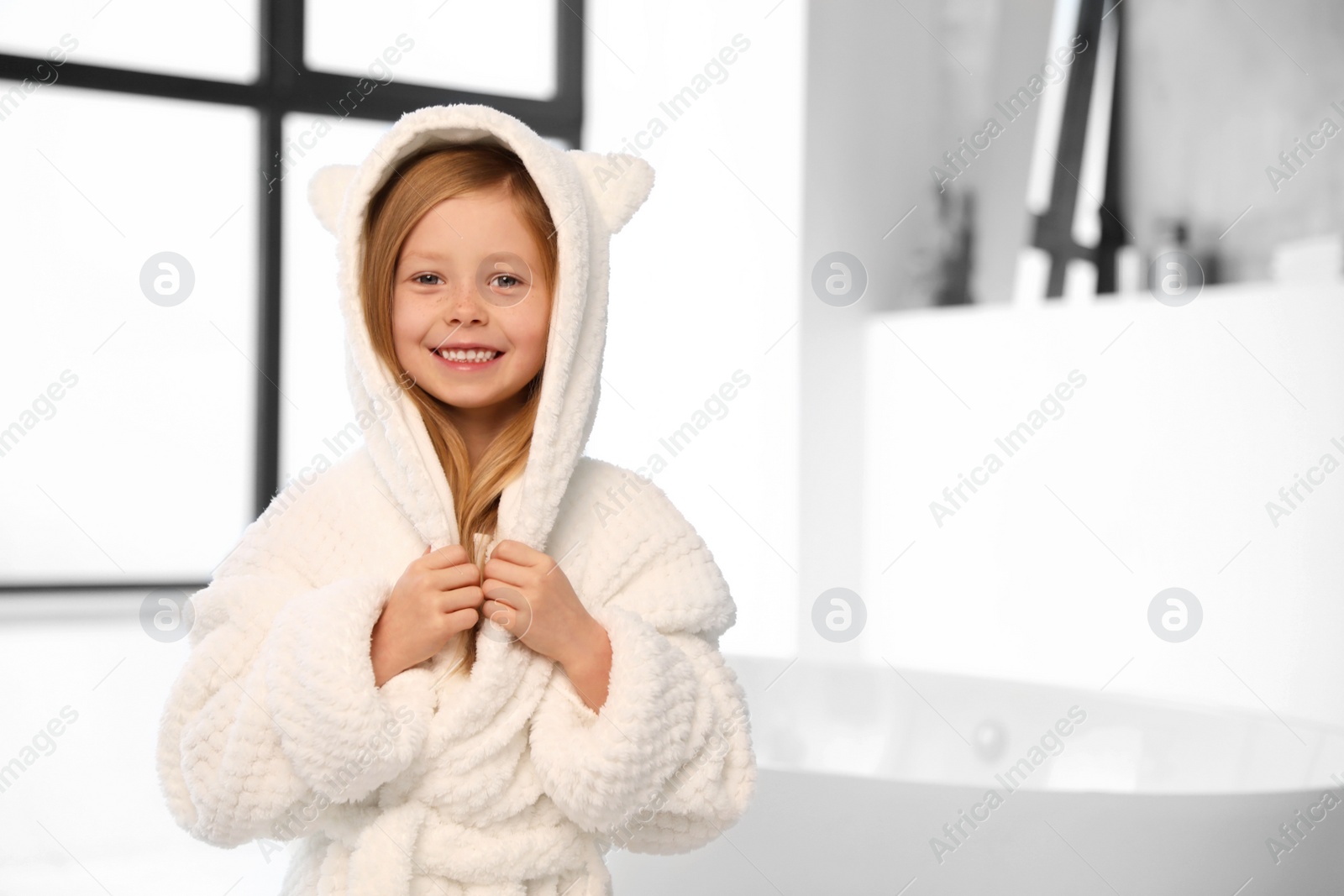 Cute little girl in bathroom. Space for text
Photo of Cute little girl in bathroom. Space for text