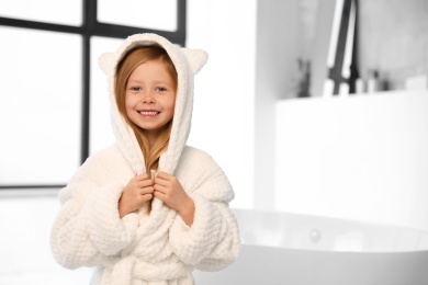 Cute little girl in bathroom. Space for text
Photo of Cute little girl in bathroom. Space for text