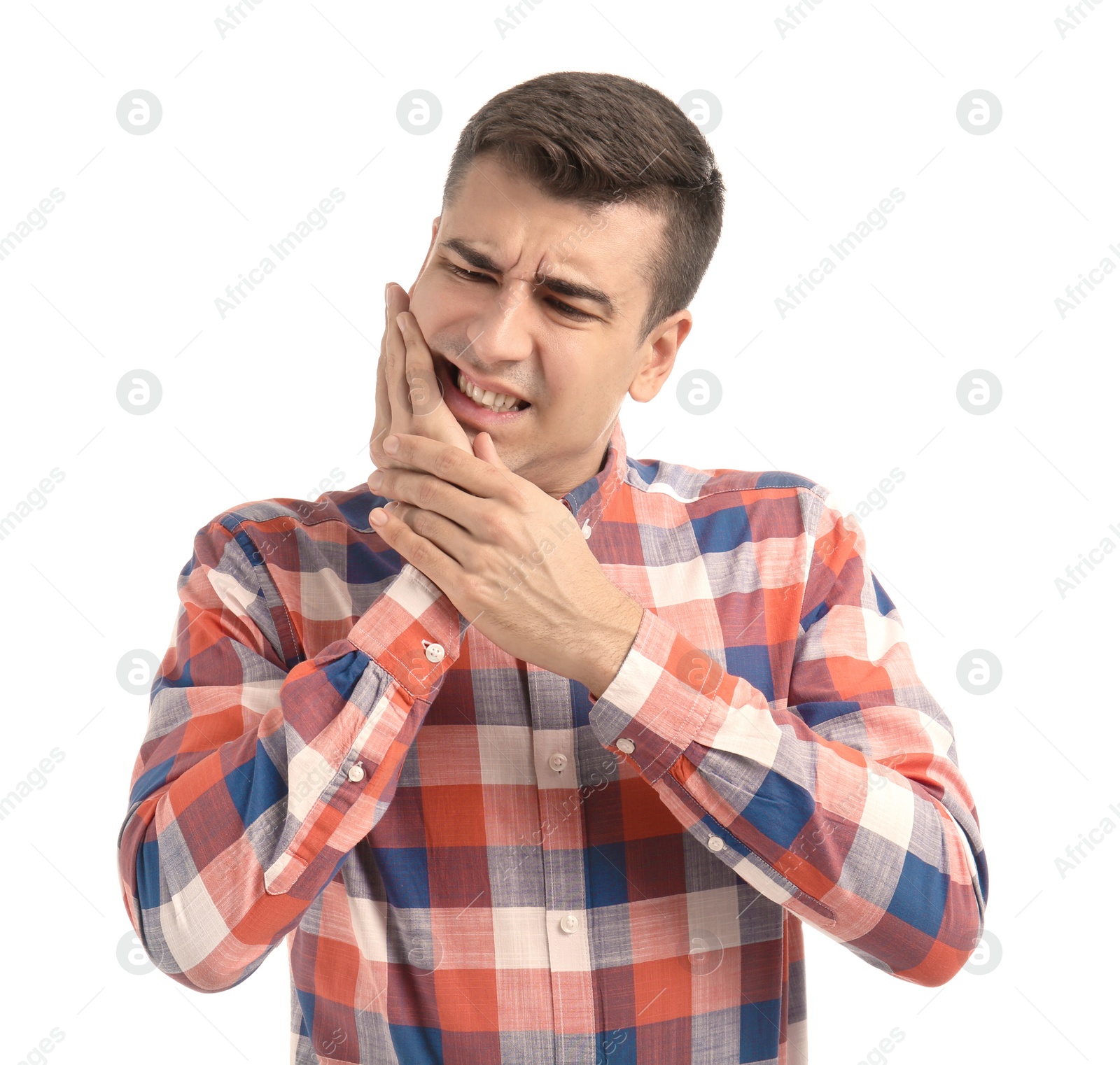 Young man suffering from toothache on white background Photo of Young man suffering from toothache on white background