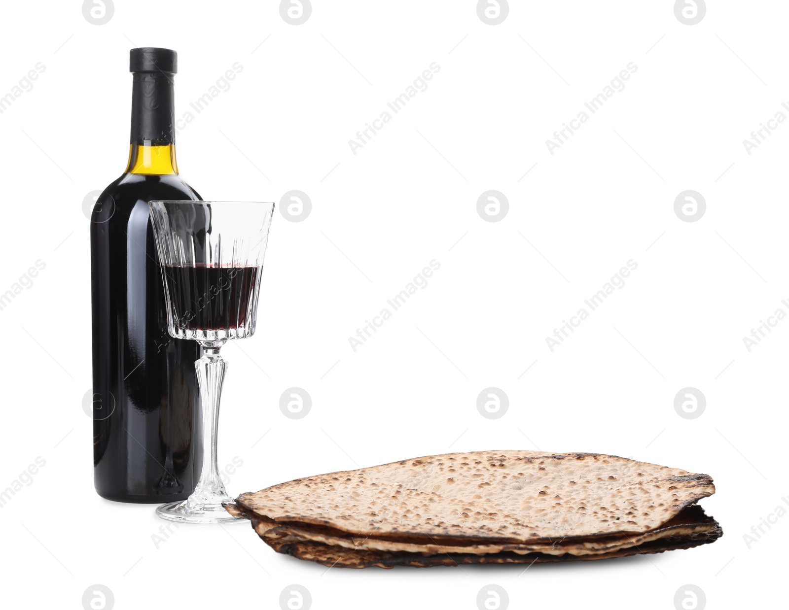 Tasty matzos and wine on white background. Passover (Pesach) celebration Photo of Tasty matzos and wine on white background. Passover (Pesach) celebration