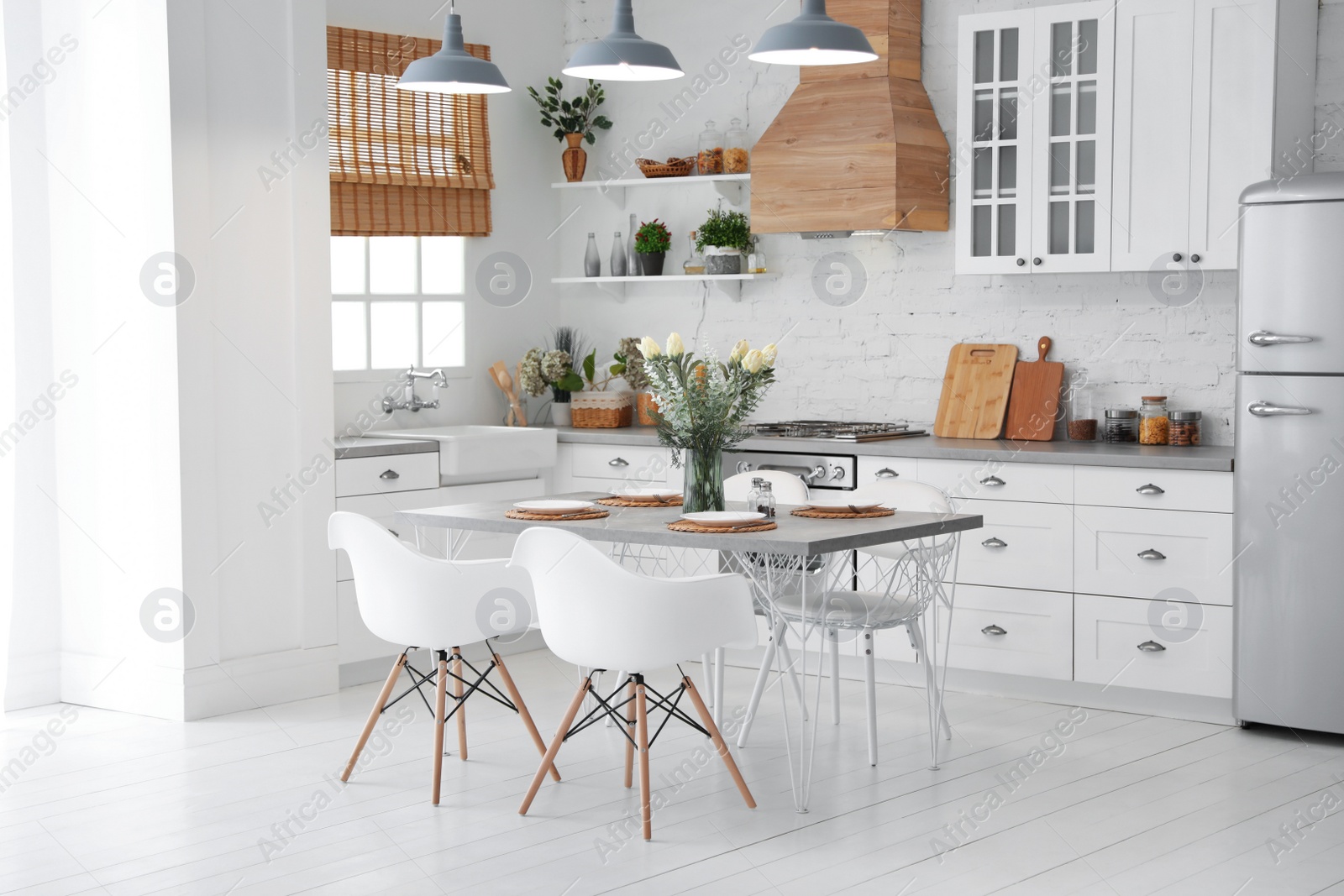 Photo of Beautiful kitchen interior with new stylish furniture