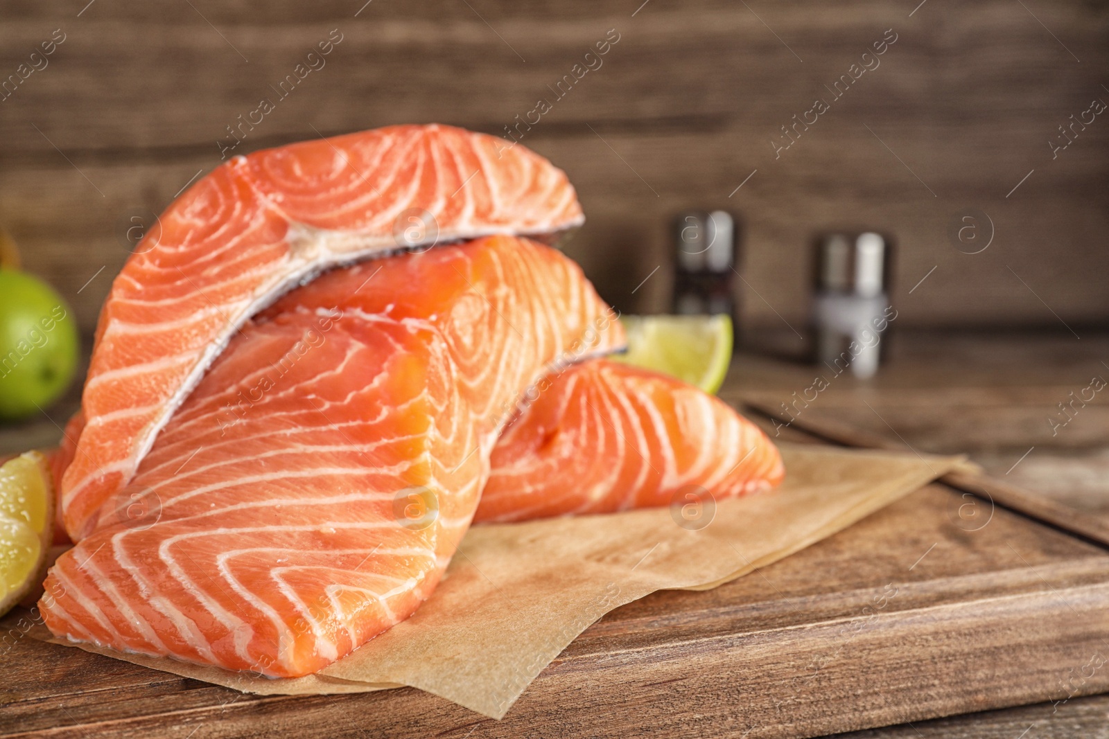 Fresh raw salmon on wooden board. Fish delicacy Photo of Fresh raw salmon on wooden board. Fish delicacy