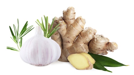 Ginger root, garlic and rosemary on white background Image of Ginger root, garlic and rosemary on white background