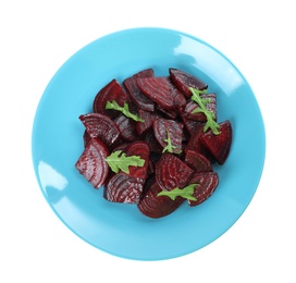 Plate with roasted beetroot slices and arugula isolated on white, top view Photo of Plate with roasted beetroot slices and arugula isolated on white, top view