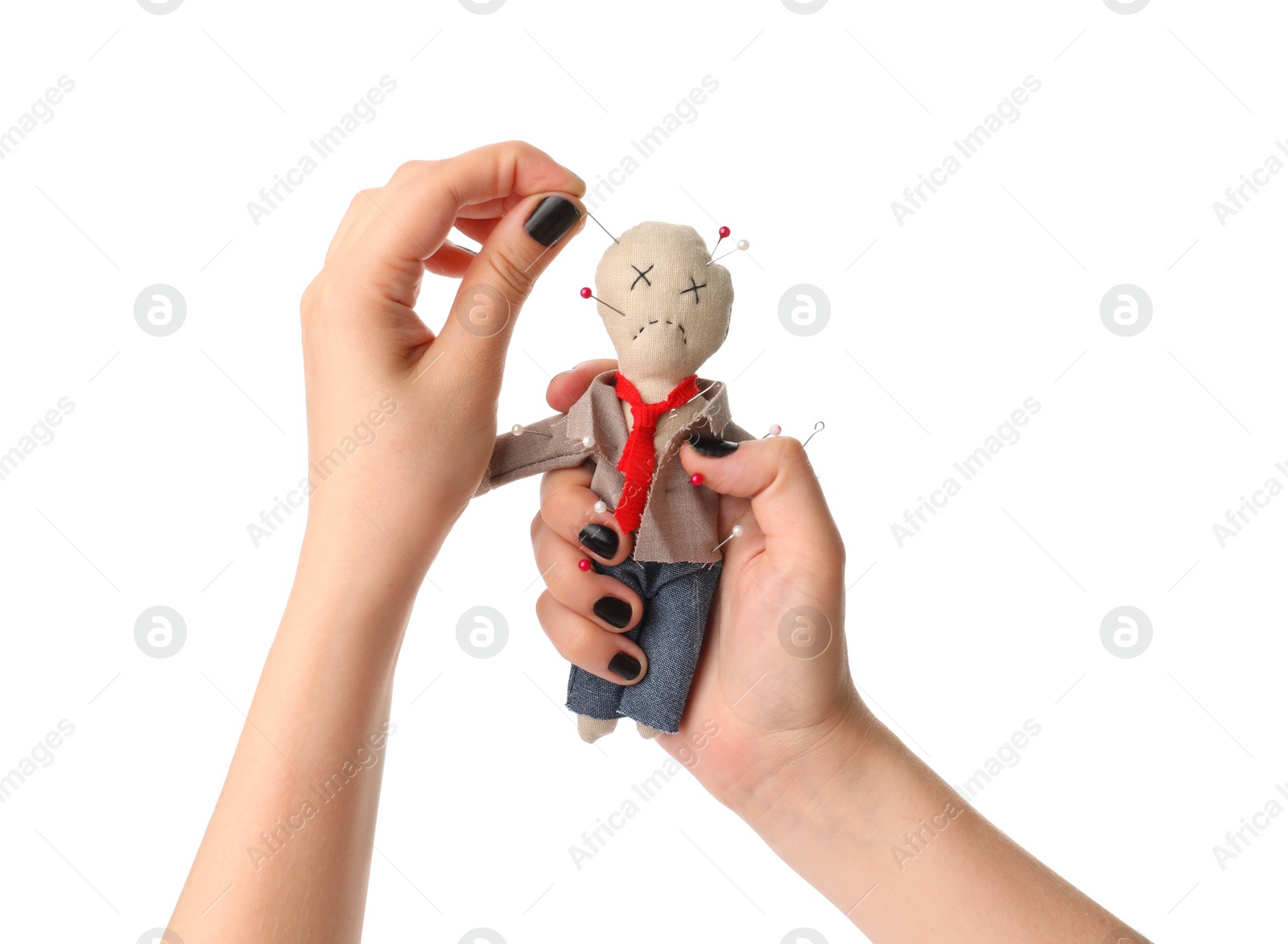 Woman stabbing voodoo doll dressed as businessman with pin on white background, closeup Photo of Woman stabbing voodoo doll dressed as businessman with pin on white background, closeup