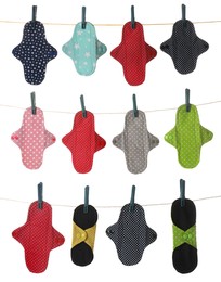 Many different cloth menstrual pads hanging on laundry line, white background Image of Many different cloth menstrual pads hanging on laundry line, white background