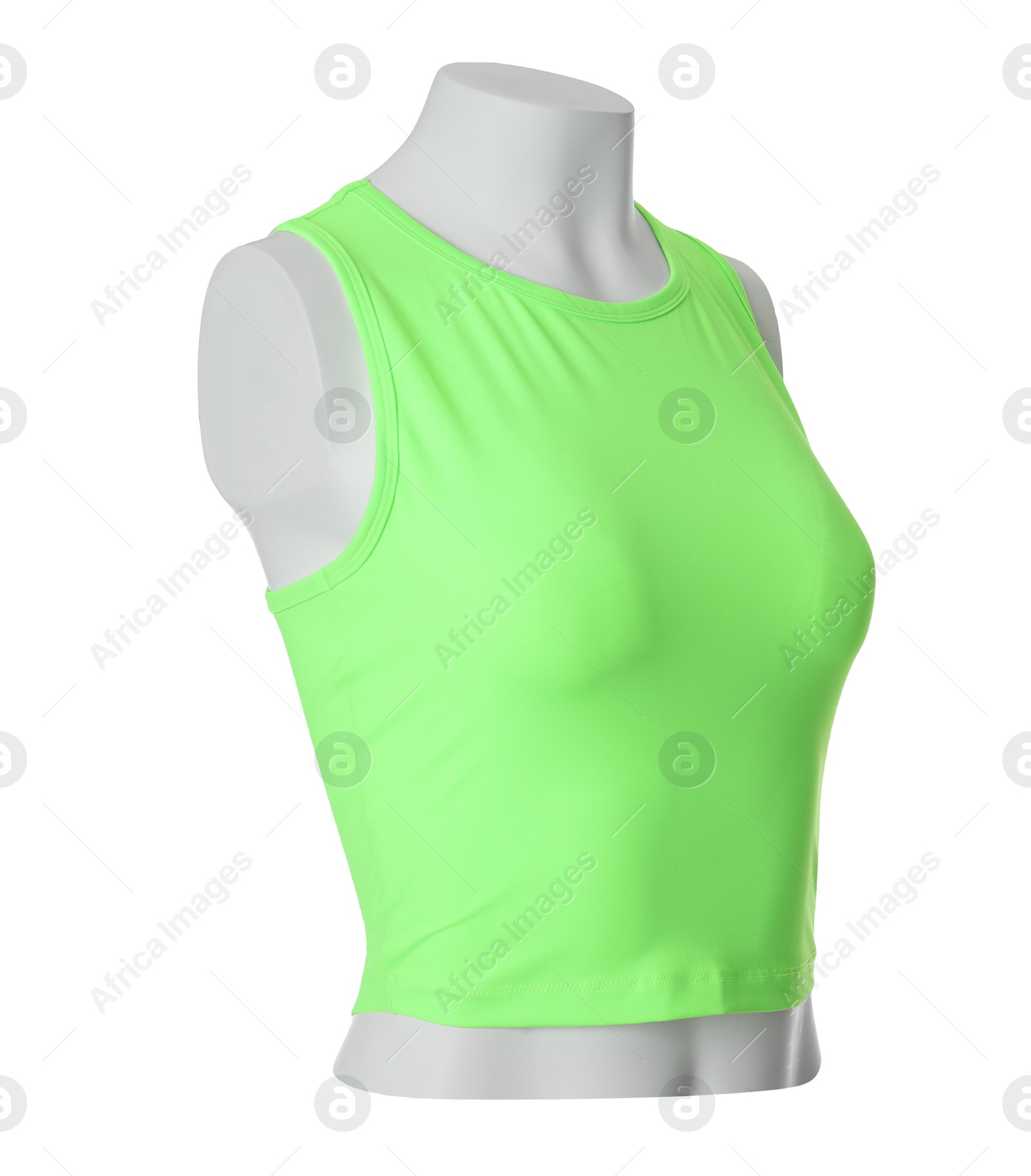 Green women's top isolated on white. Sports clothing Photo of Green women's top isolated on white. Sports clothing