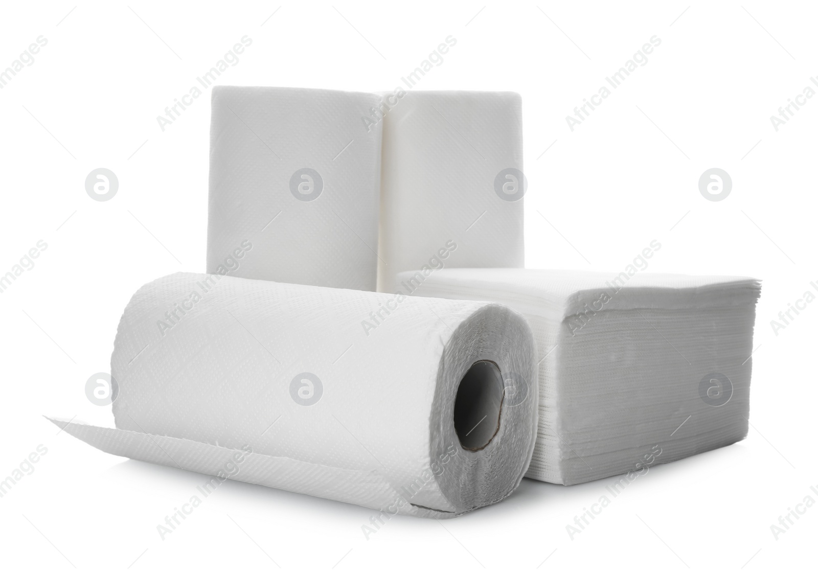 Rolls and stack of clean paper tissues on white background Photo of Rolls and stack of clean paper tissues on white background
