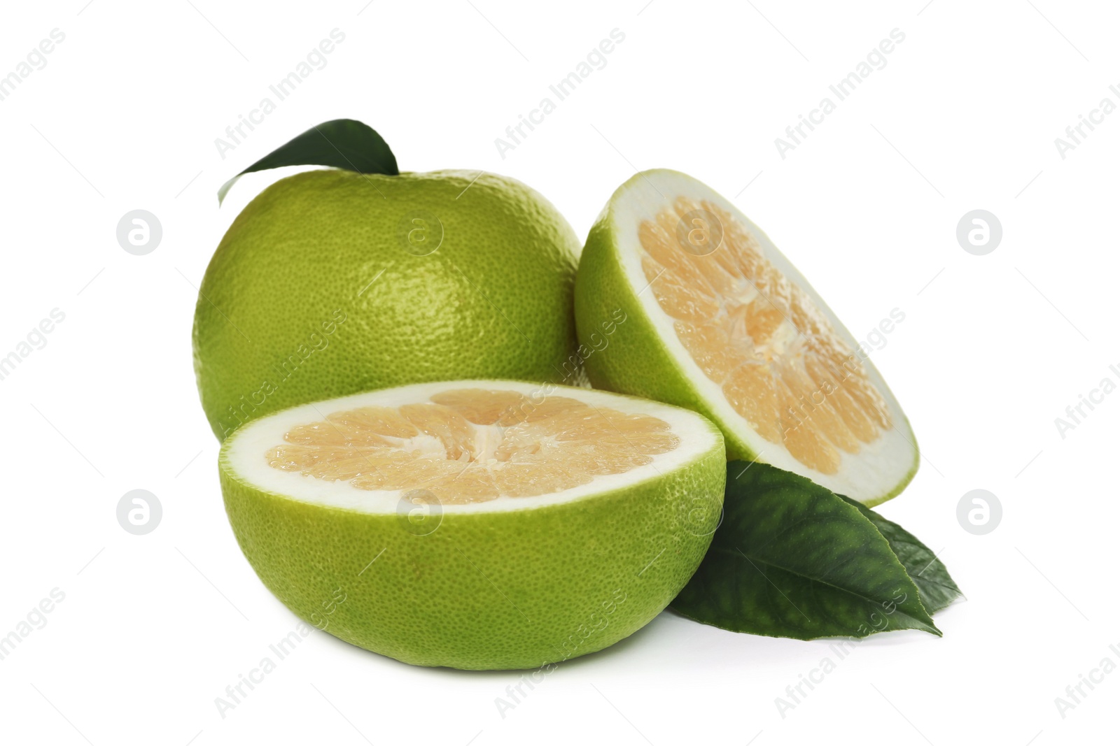 Photo of Whole and cut sweetie fruits with green leaves on white background