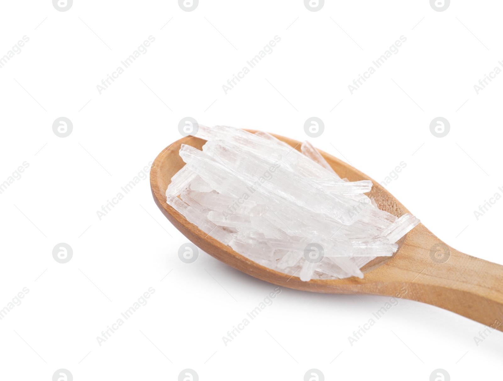 Menthol crystals in spoon on white background Photo of Menthol crystals in spoon on white background