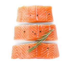 Photo of Fresh raw salmon with pepper and rosemary on white background, top view. Fish delicacy