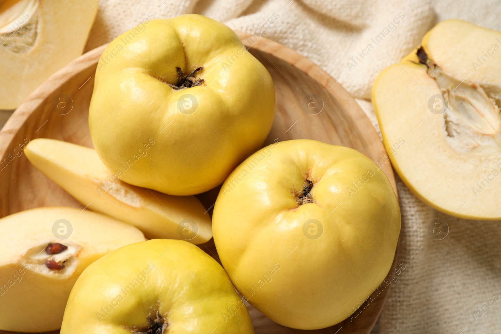 Fresh ripe organic quinces on table, flat lay Photo of Fresh ripe organic quinces on table, flat lay
