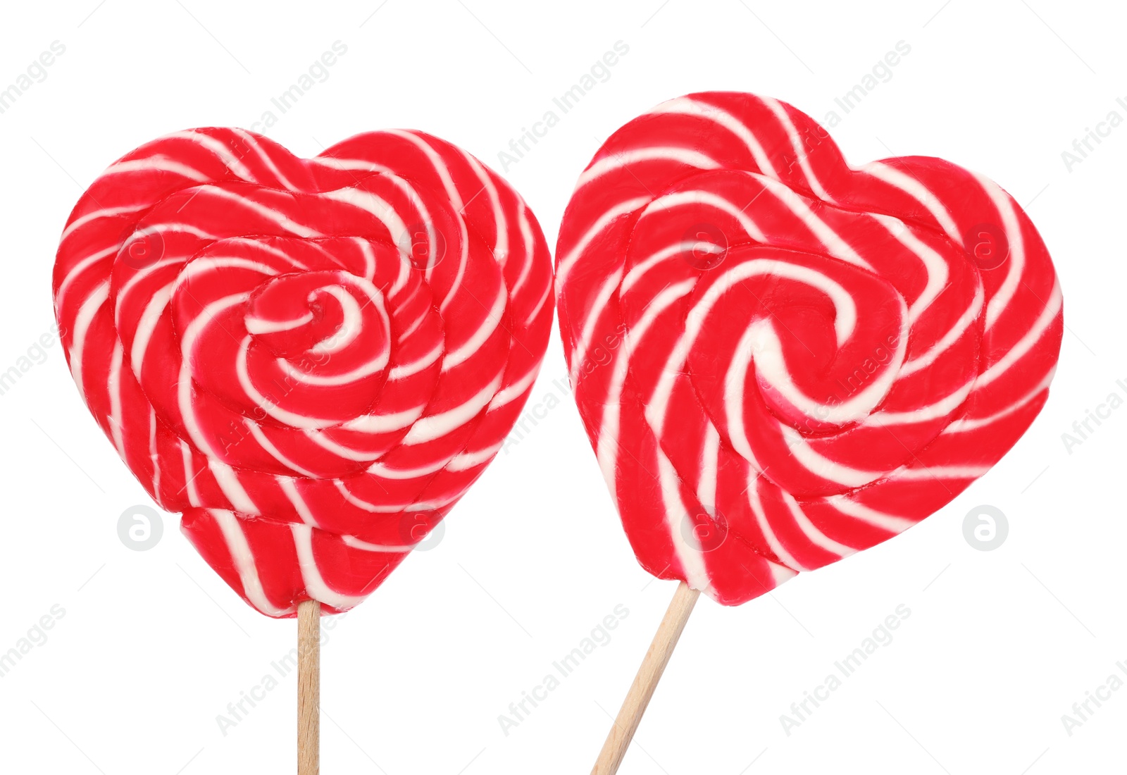 Sweet heart shaped lollipops on white background. Valentine's day celebration Photo of Sweet heart shaped lollipops on white background. Valentine's day celebration