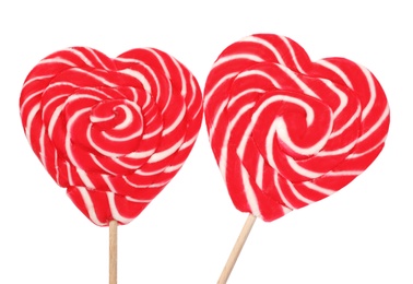 Sweet heart shaped lollipops on white background. Valentine's day celebration Photo of Sweet heart shaped lollipops on white background. Valentine's day celebration