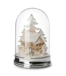 Beautiful snow globe with house and trees isolated on white Photo of Beautiful snow globe with house and trees isolated on white