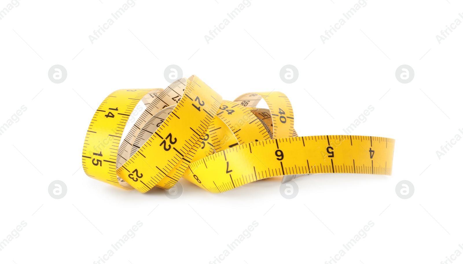 New yellow measuring tape isolated on white Photo of New yellow measuring tape isolated on white