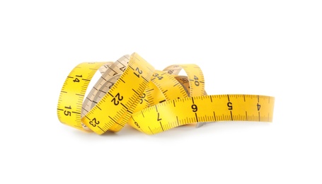 New yellow measuring tape isolated on white Photo of New yellow measuring tape isolated on white