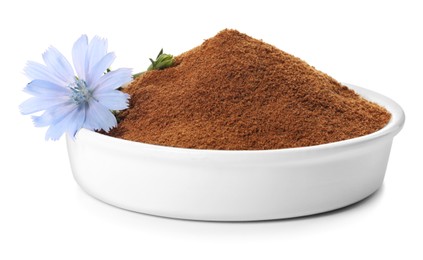 Plate of chicory powder and flower on white background Photo of Plate of chicory powder and flower on white background