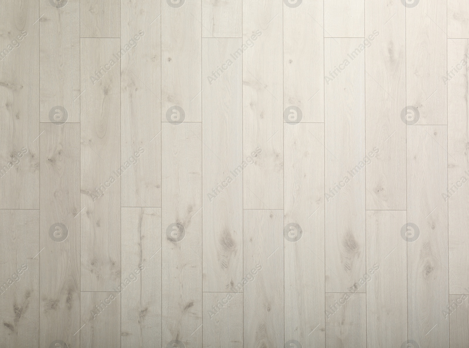 Light wooden laminate as background, top view. Floor covering Photo of Light wooden laminate as background, top view. Floor covering