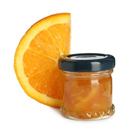 Jar with orange jam and fresh fruit on white background Photo of Jar with orange jam and fresh fruit on white background