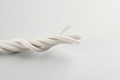 Closeup view of electrical power cables on white background Photo of Closeup view of electrical power cables on white background