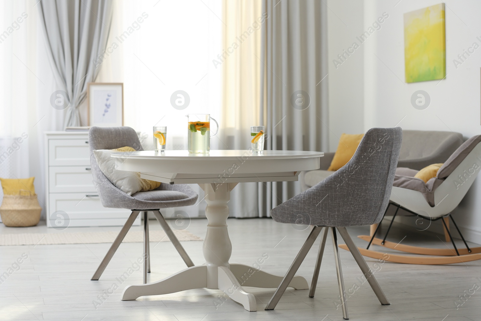 Modern living room interior with beautiful curtains on window Photo of Modern living room interior with beautiful curtains on window