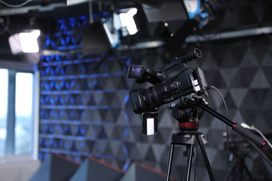 Modern video recording studio with professional equipment, focus on camera Photo of Modern video recording studio with professional equipment, focus on camera