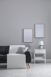 Stylish living room interior with comfortable sofa Photo of Stylish living room interior with comfortable sofa