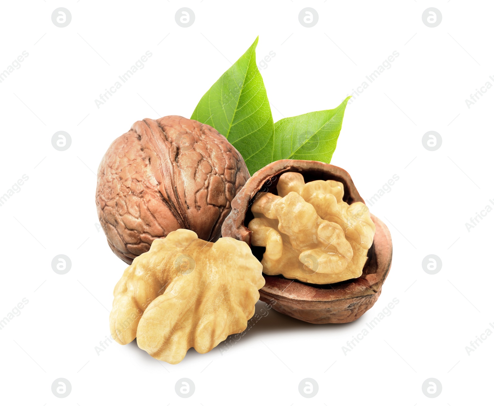Tasty walnuts and green leaves on white background Image of Tasty walnuts and green leaves on white background
