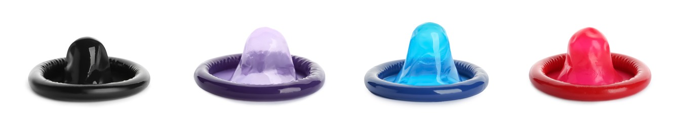 Set with different unpacked condoms on white background. Banner design Image of Set with different unpacked condoms on white background. Banner design
