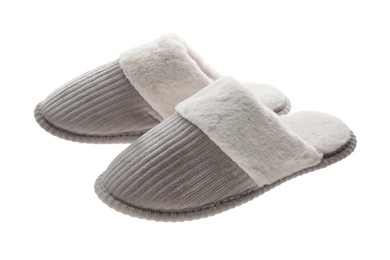 Pair of soft closed toe slippers on white background Photo of Pair of soft closed toe slippers on white background