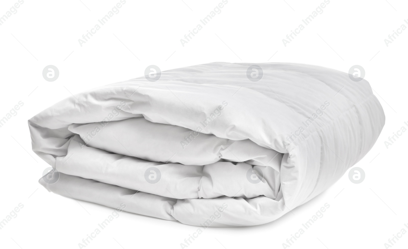 Folded soft blanket on white background. Household textile Photo of Folded soft blanket on white background. Household textile